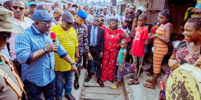 Delta Governor, Rt Hon Sheriff Oborevwori (left), making an observation during his inspection of drains in Okugbe street under construction in Ughelli, Ughelli North Local Government Area on Friday. On the Governor's left is Olorogun John Oguma of Obakpor Engineering Ltd, on Friday. Pix Enarusai Bripin